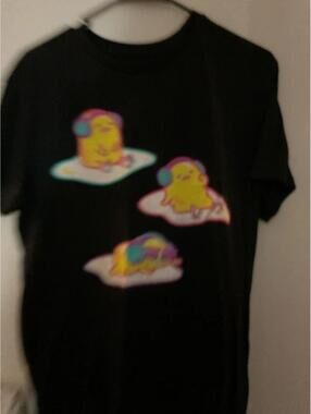 Sanrio Gudetama The Lazy Egg Rollerskating Graphi tshirt